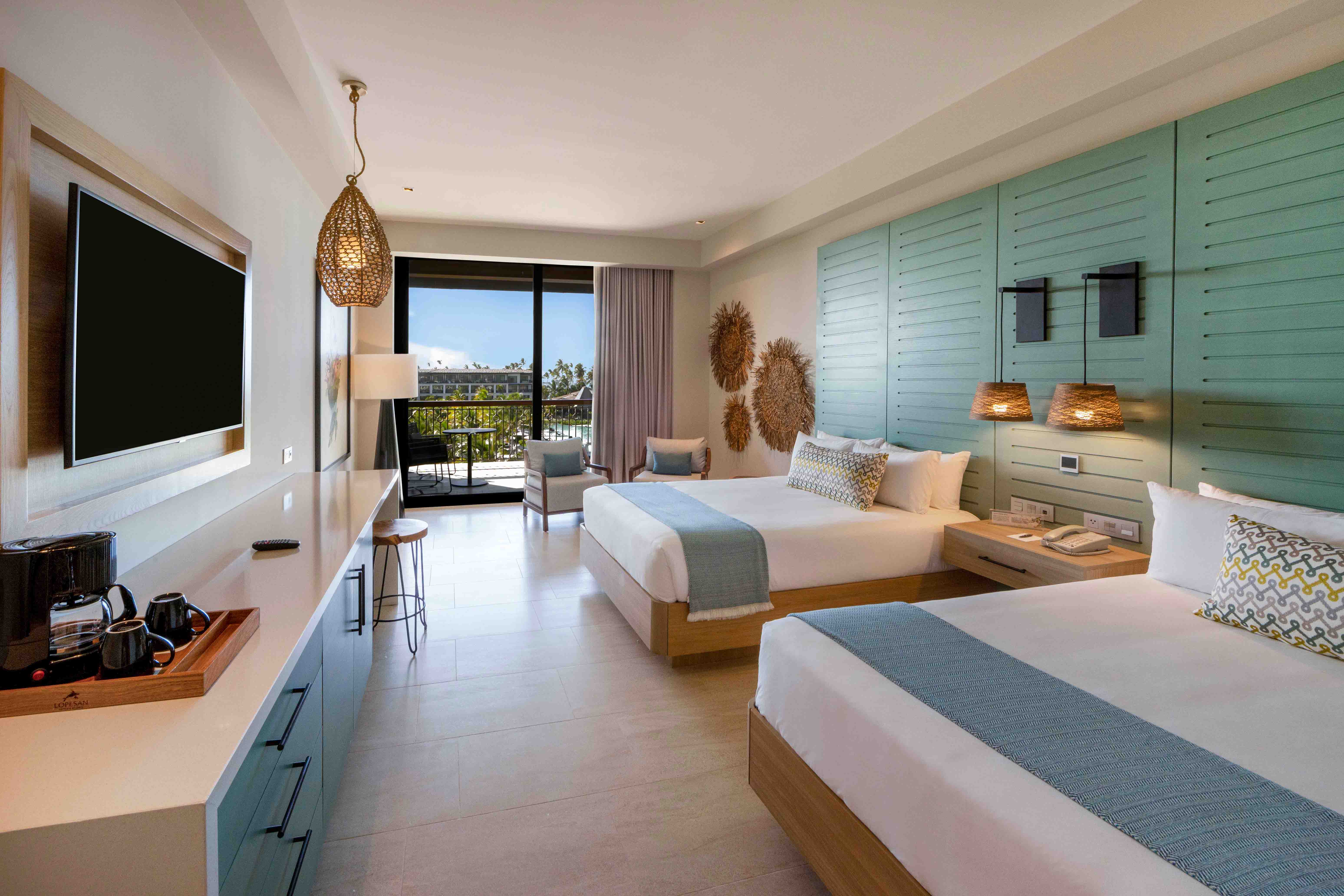cama resort queen ocean view junior suite lopesan costa bavaro resort spa & casino